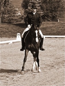 Jim and Esprit riding the Intermediare-1 dressage test at a USDF, USEF-rated show.