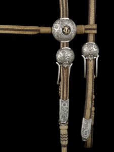 Drain created the sterling silver buckles, tips and conchas for this two-tone browband headstall by TCAA rawhide braider Pablo Lozano. The piece appeared in the 2014 TCAA exhibition. COURTESY NATIONAL COWBOY MUSEUM 