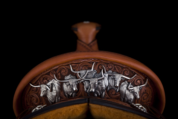  Bean decorated his 2012 TCAA saddle’s cantleback with a Longhorn herd in sterling silver. The saddlemaker typically handles his own silverwork. Photo courtesy NATIONAL COWBOY & WESTERN HERITAGE MUSEUM