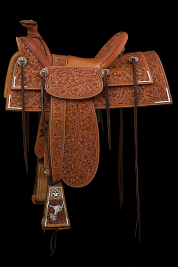 Bean’s 2012 TCAA saddle honored the Great Plains trail drives of the 1870s. The half-seat saddle has period Joseph Stamstag rigging, and is built on a modified Visalia tree. Photo courtesy NATIONAL COWBOY & WESTERN HERITAGE MUSEUM